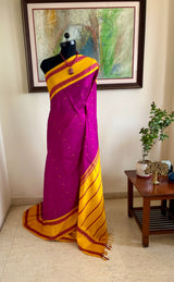 PRABHIKA – MAGENTA KORVAI KANJIVARAM WITH MUSTARD RUDRAKSHA BORDER