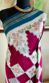 PRABHATHI – WHITE PUTAPAKKA IKKAT WITH TEAL BLUE ZARI BORDER
