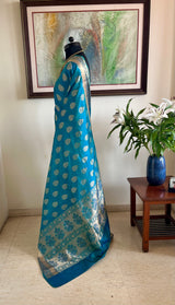 DEVALIKA – SHOT BLUE BANARASI WITH GOLD FLORAL MOTIFS