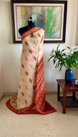 REBATI – CREAM AND RUST BOMKAI SILK WITH RUDRAKSHA BORDER