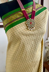 KAIRAVI - BEIGE GREEN KORVAI KATTAM KANJIVARAM PAISLEY SAREE