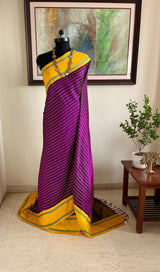 SHANKARI – VELDHARI KANJIVARAM IN RICH PURPLE WITH YELLOW BORDER DETAILS