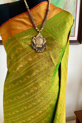 BHUVI – GREEN KANJIVARAM SILK WITH RUST GOLD BORDER AND MOTIFS