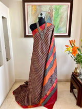 ABITHA- LIGHT RUST PRINTED TUSSAR WITH STRIPED BORDER