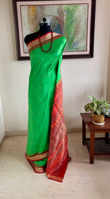 BANAJYOTSANA — GREEN BOMKAI SILK WITH AN INTRICATELY WOVEN AANCHAL