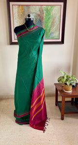 VIJAYAMBIKA — GREEN KANJIVARAM SILK WITH A DISTINCTIVE WOVEN GRID