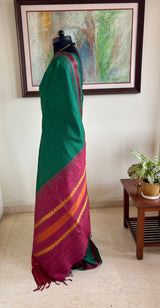 VIJAYAMBIKA — GREEN KANJIVARAM SILK WITH A DISTINCTIVE WOVEN GRID