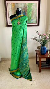 YUKTASHREE – GREEN DOUBLE AANCHAL BOMKAI WITH TEAL WEAVES