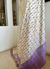 DIPANWITA – CREAM ASSAM SILK WITH ABUNDANT PURPLE FLORALS