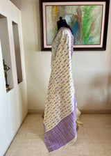 DIPANWITA – CREAM ASSAM SILK WITH ABUNDANT PURPLE FLORALS