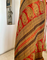 AVEYA- MUSTARD PURE GEORGETTE WITH BAGH PRINT CONTRASTS