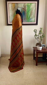 AVEYA- MUSTARD PURE GEORGETTE WITH BAGH PRINT CONTRASTS