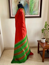 MAENIKA – RUST KANJIVARAM WITH GREEN BORDER AND AANCHAL