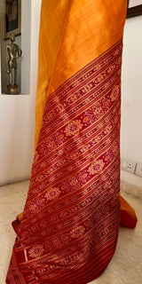ANUSHRUTI – BURNT ORANGE KHANDUA WITH BANDHA MOTIFS