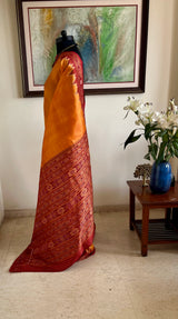 ANUSHRUTI – BURNT ORANGE KHANDUA WITH BANDHA MOTIFS
