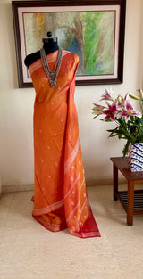 PARIZA — LIGHTWEIGHT ORANGE BANARASI SILK WITH DELICATE FLORALS