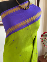 DOORVA — LEAF GREEN KORVAI KANJIVARAM WITH PURPLE CONTRASTS