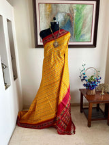 SONAKSHI- A RADIANT YELLOW PATOLA SILK SAREE, A TAPESTRY IN ELEGANCE AND CHARM