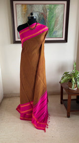 NAYANA – A KANJIVARAM SILK WITH CHECKS AND PEACOCK MOTIFS