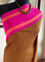 NAYANA – A KANJIVARAM SILK WITH CHECKS AND PEACOCK MOTIFS