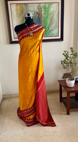 PRAYUTA – BURNT ORANGE POCHAMPALLY WITH DIAMOND IKKAT
