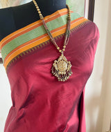 MEGAVALLI – MAROON KANJIVARAM WITH TEAL BORDER AND TEMPLE MOTIFS