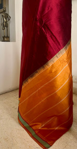 MEGAVALLI – MAROON KANJIVARAM WITH TEAL BORDER AND TEMPLE MOTIFS