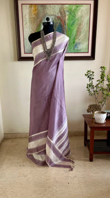 SRUTIKA – PASTEL MAUVE KANJIVARAM WITH OFF-WHITE FLORAL BORDER