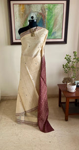 SUBHA – CREAM KANJIVARAM WITH CHOCOLATE BROWN FLORAL MOTIFS