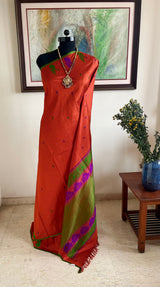 MRIDULIKA – RUST KANJIVARAM WITH REGAL PEACOCK WEAVES
