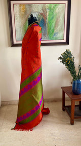 MRIDULIKA – RUST KANJIVARAM WITH REGAL PEACOCK WEAVES