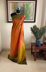NAMYA – RUST ORANGE KANJIVARAM WITH OLIVE GREEN CONTRAST