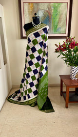 PRADITA- PUTAPAKKA IKKAT WITH FLORAL SQUARES AND LAYERED ZARI