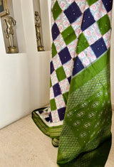 PRADITA- PUTAPAKKA IKKAT WITH FLORAL SQUARES AND LAYERED ZARI