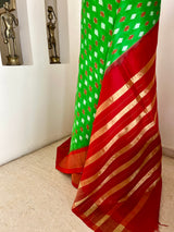 JAYINI- LEAF GREEN PATOLA SILK WITH RED AND GOLD ZARI AANCHAL