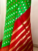 JAYINI- LEAF GREEN PATOLA SILK WITH RED AND GOLD ZARI AANCHAL