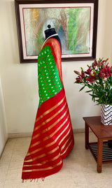 JAYINI- LEAF GREEN PATOLA SILK WITH RED AND GOLD ZARI AANCHAL