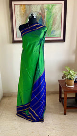 MADHUMAI – SEA GREEN KANJIVARAM WITH NAVY ZARI ELEGANCE