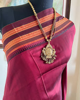 AVANIKA — MAROON NARAYANPET SILK WITH A CLASSIC BLACK BORDER