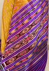 SUSHWETA- OCHRE KHANDUA SILK WITH BANDHA AND FLORAL MOTIFS