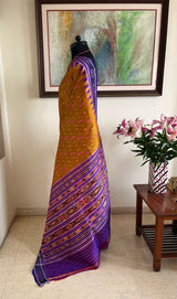 SUSHWETA- OCHRE KHANDUA SILK WITH BANDHA AND FLORAL MOTIFS