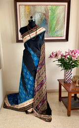 RINITA – BLACK KHANDUA SILK WITH TEMPLE BODY AND BANDHA BORDERS