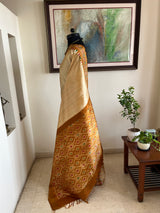 VIDHISHA – PEACH CREAM PATOLA WITH DIAMOND AANCHAL AND ZARI BORDER