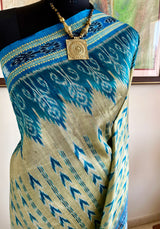 NILOTAMA – LIGHT BEIGE KHANDUA WITH BLUE IKKAT AANCHAL