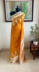 ELINAA – OCHRE ODISHA HANDLOOM WITH FLORAL BANDHA AND TEMPLE MOTIFS