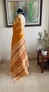 ELINAA – OCHRE ODISHA HANDLOOM WITH FLORAL BANDHA AND TEMPLE MOTIFS