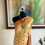 NANDANA – BEIGE BAGHAMBARI KHANDUA WITH BANDHA AND RUDRAKSHA BORDER
