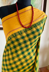 MEDHINI – MUSTARD TEMPLE BORDER ON GREEN CHECKED KANJIVARAM SILK