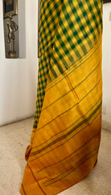 MEDHINI – MUSTARD TEMPLE BORDER ON GREEN CHECKED KANJIVARAM SILK