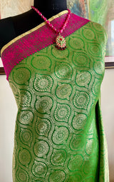 SAANJH- GREEN KATAN BANARASI SAREE WITH PINK PURPLE BORDERS